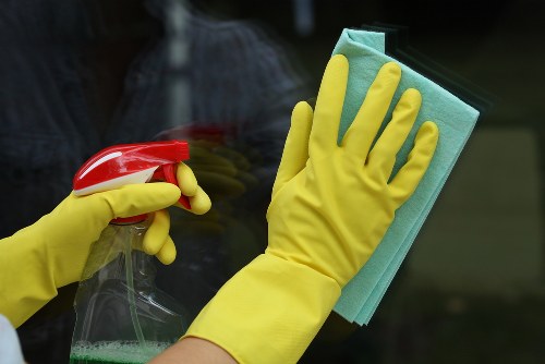 Professional oven cleaner in Dulwich deep cleaning a built-in oven