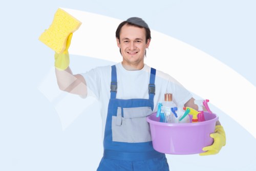 Worker managing safety checks before carpet cleaning